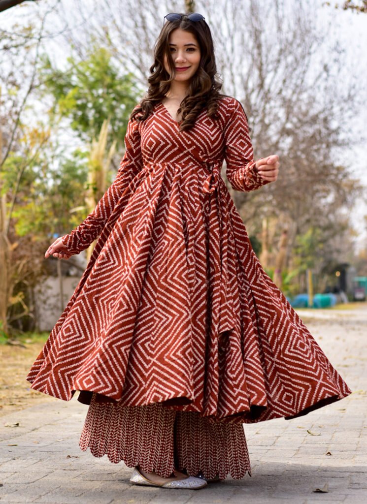 Popular brown cotton-silk traditional gown .